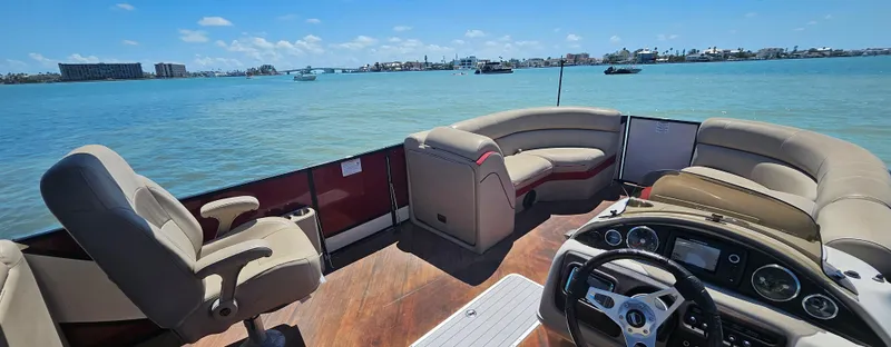 Slide: The Image of Pontoon boat interior on water, South Bay 500, 2017 model, sunny day. - 14