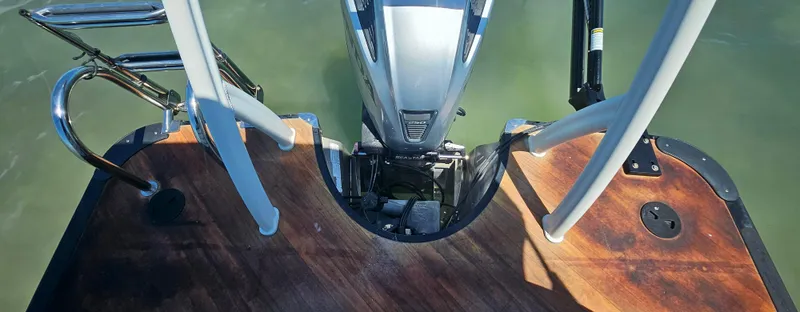 Slide: The Image of Rear view of a 2017 South Bay 500 boat with motor and swim platform. - 16