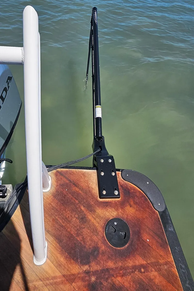 Slide: The Image of 2017 South Bay 500 boat deck with railing and water view. - 25