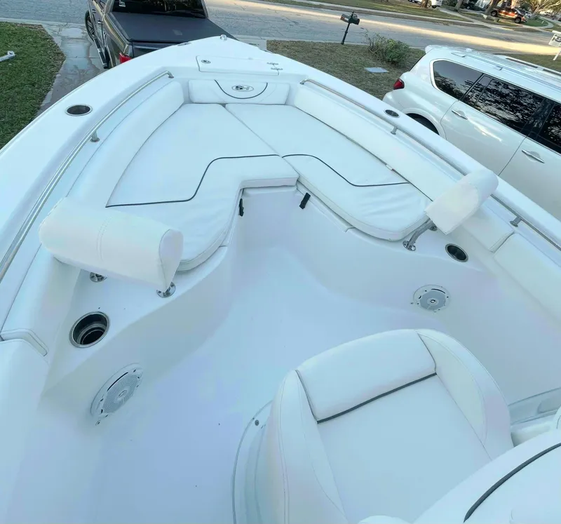 Slide: The Image of 2017 Sea Hunt 225 Ultra boat interior with white seating, includes 2021 trailer. - 15