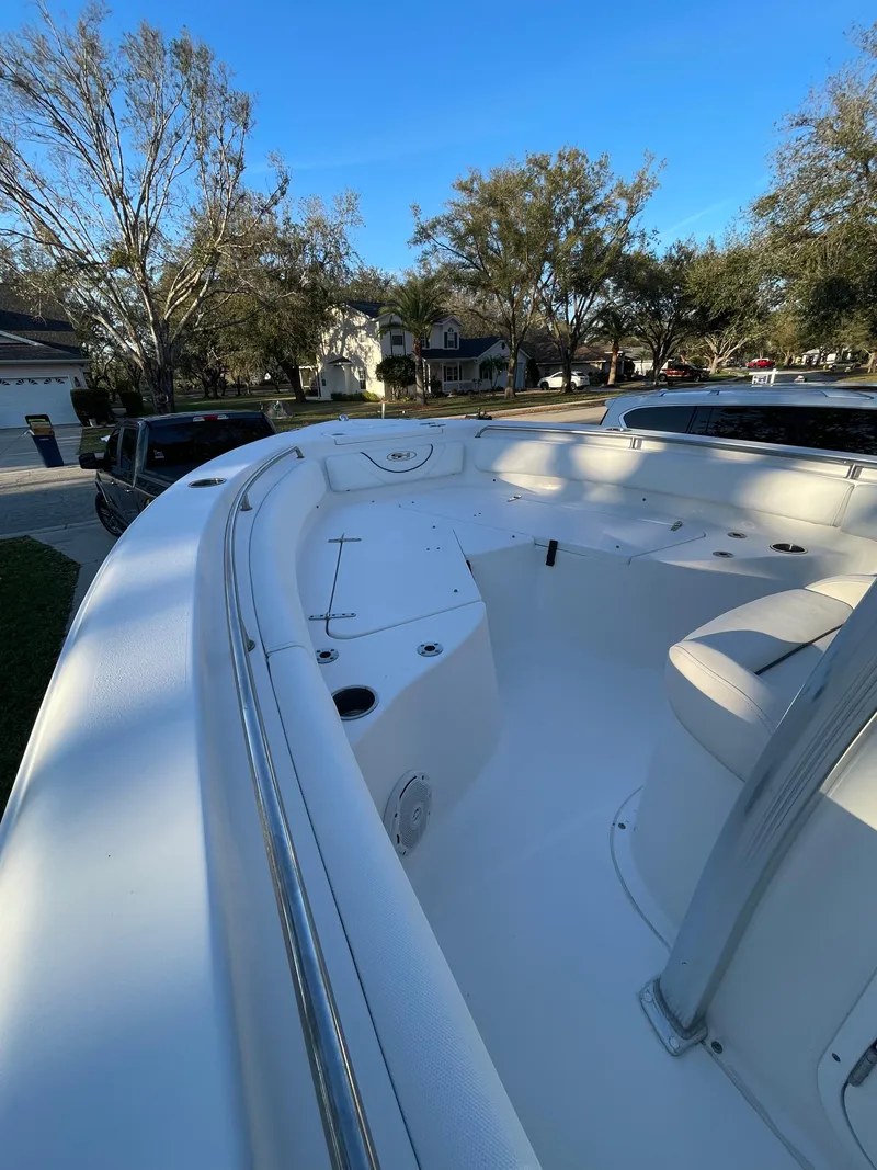 Slide: The Image of 2017 Sea Hunt 225 Ultra boat with trailer, spacious deck, and 385 hours of use. - 8