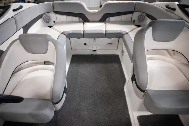 Slide: The Image of Interior of 2012 Yamaha Boats 212SS, featuring spacious seating and modern design. - 12