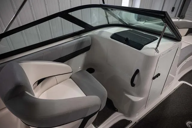 Slide: The Image of Interior of 2012 Yamaha Boats 212SS, featuring sleek seating and modern dashboard design. - 9