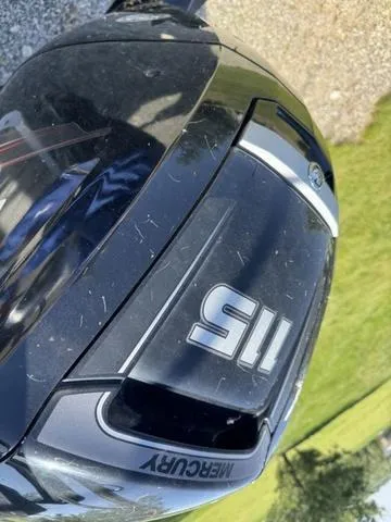 Slide: The Image of Close-up of a 2014 Berkshire STS Series 233SL BP3 boat engine, featuring Mercury branding. - 3