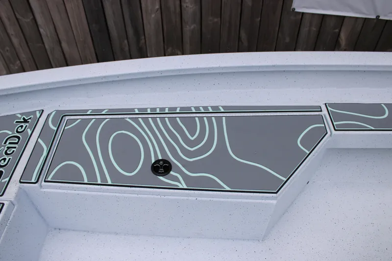 Slide: The Image of 2025 Xpress H22B boat deck with stylish SeaDek pattern. - 10