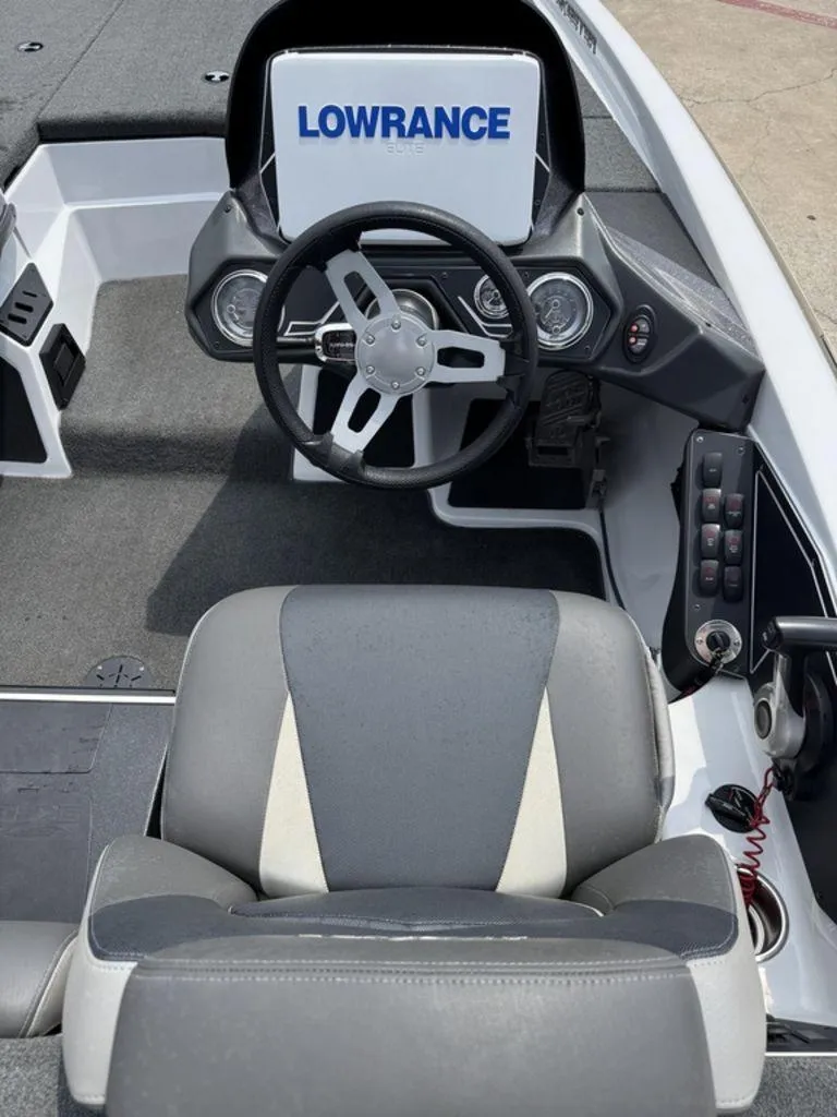Slide: The Image of 2017 Skeeter ZX200 boat cockpit with Lowrance Elite display and steering wheel. - 5