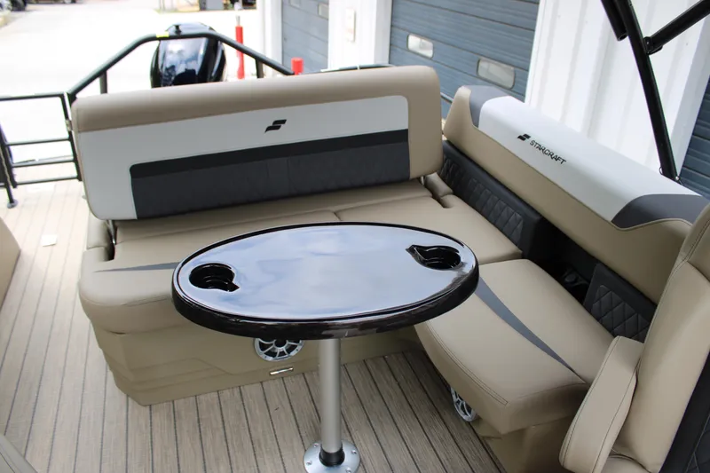 Slide: The Image of 2025 Starcraft SLS-3 Q DH boat interior with seating and table. - 17