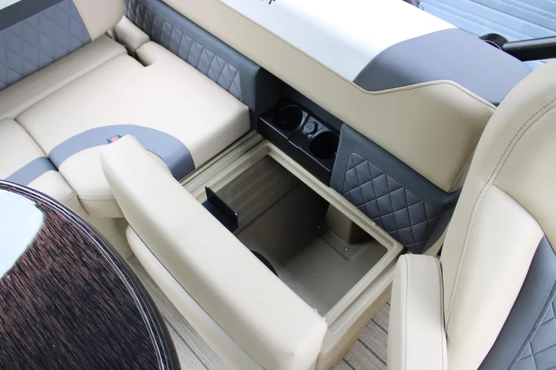Slide: The Image of 2025 Starcraft SLS-3 Q DH boat interior with beige and gray seating. - 7