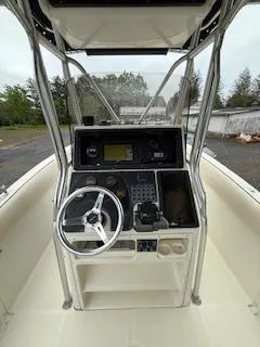 Slide: The Image of 2002 Hydra-Sports 2390 CC Vector boat console with steering wheel and navigation equipment. - 10