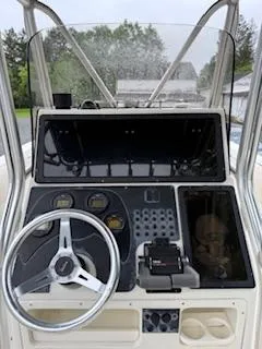 Slide: The Image of Console of 2002 Hydra-Sports 2390 CC Vector boat with steering wheel and gauges. - 12
