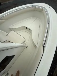 Slide: The Image of 2002 Hydra-Sports 2390 CC Vector boat interior with white seating and railings. - 15