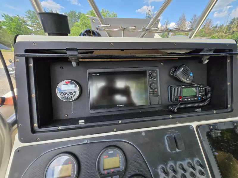 Slide: The Image of 2002 Hydra-Sports 2390 CC Vector dashboard with Garmin GPS and marine radio. - 20