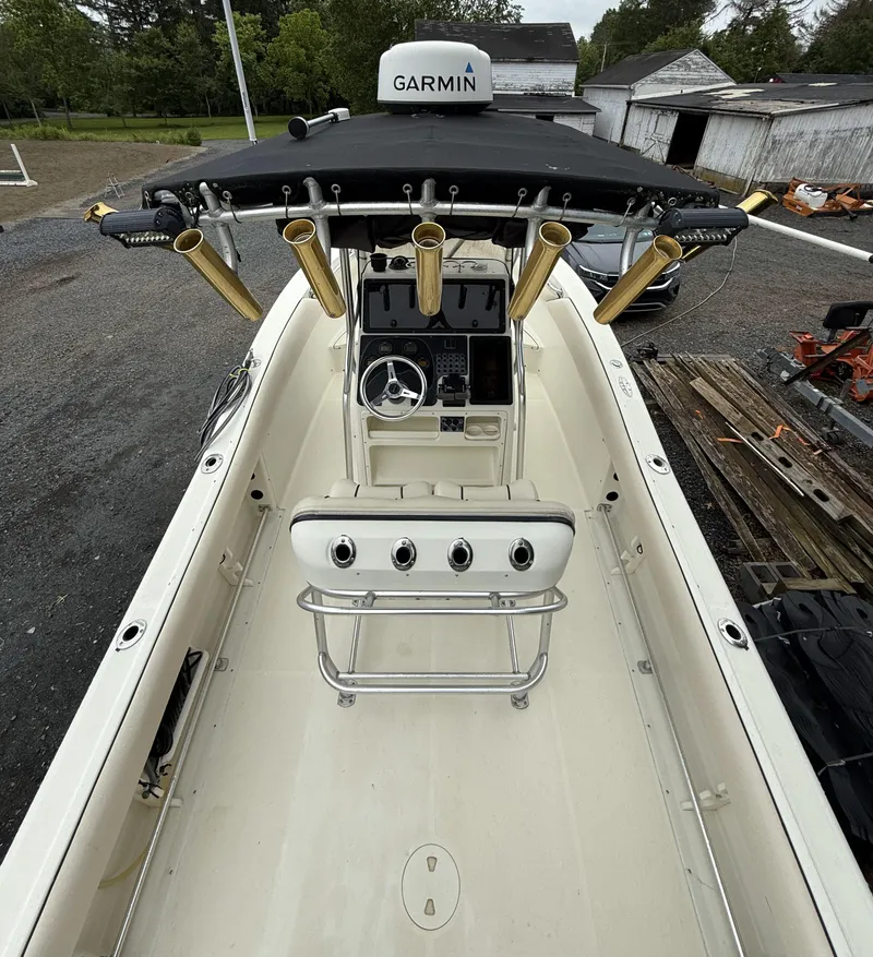 Slide: The Image of 2002 Hydra-Sports 2390 CC Vector boat with Garmin equipment, docked outdoors. - 23