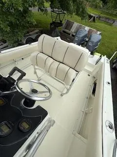 Slide: The Image of 2002 Hydra-Sports 2390 CC Vector boat interior with steering wheel and seating. - 26