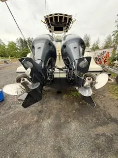 Slide: The Image of 2002 Hydra-Sports 2390 CC Vector boat with dual outboard motors, rear view. - 31