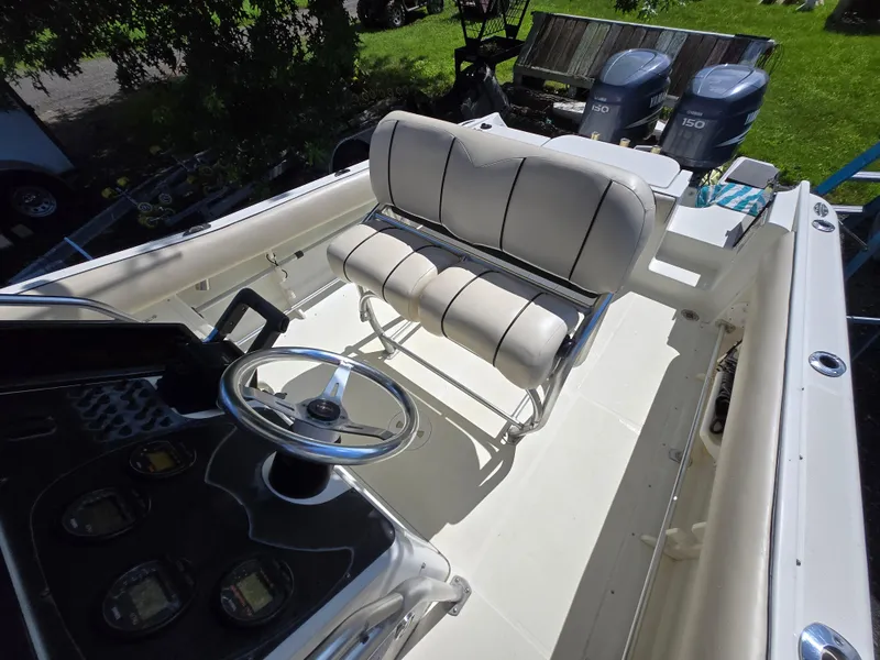 Slide: The Image of 2002 Hydra-Sports 2390 CC Vector boat interior with steering wheel and seating. - 36