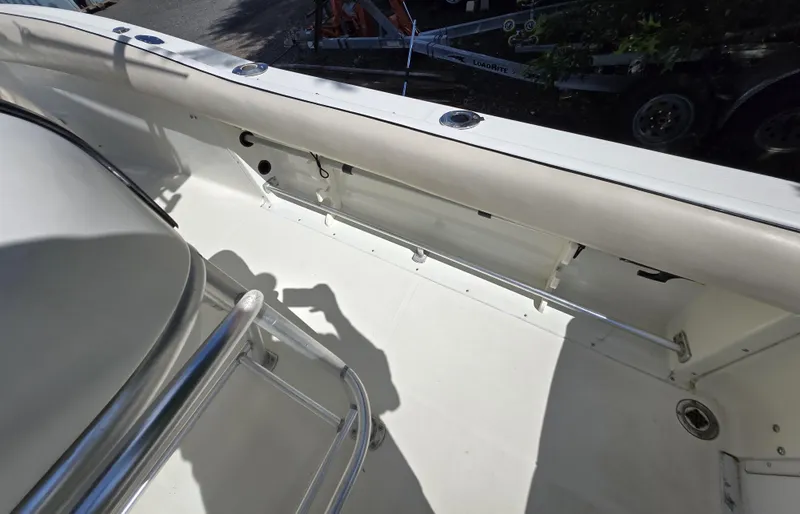 Slide: The Image of 2002 Hydra-Sports 2390 CC Vector boat interior with stainless steel railing and seating area. - 46