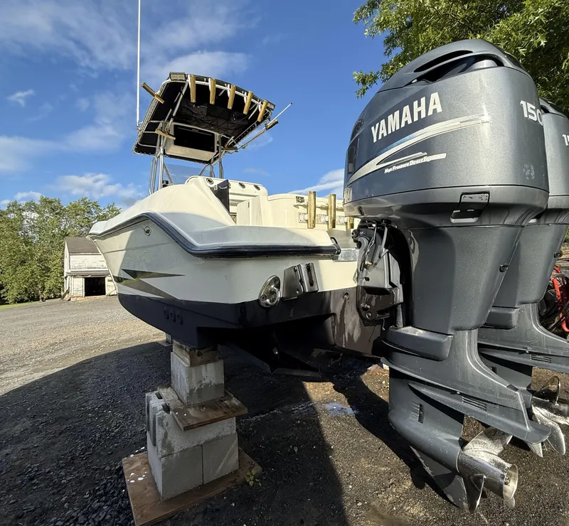 Slide: The Image of 2002 Hydra-Sports 2390 CC Vector boat with Yamaha 150 outboard motor on blocks. - 9