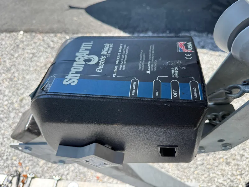 Slide: The Image of Electric winch on a 2022 Key West 203 DFS boat trailer. - 13