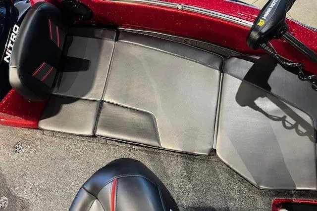 Slide: The Image of 2025 Nitro ZV19 Sport boat interior with sleek black seating and red accents. - 3