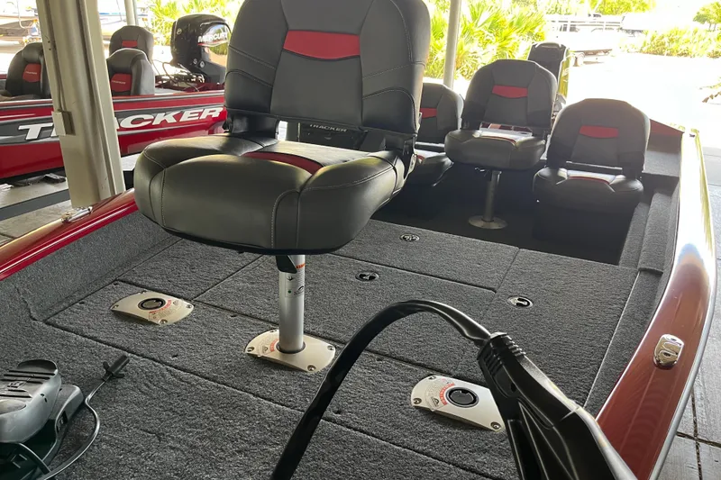 Slide: The Image of 2025 Tracker Pro Team 175 Crappie Edition boat interior with seating and fishing deck. - 4