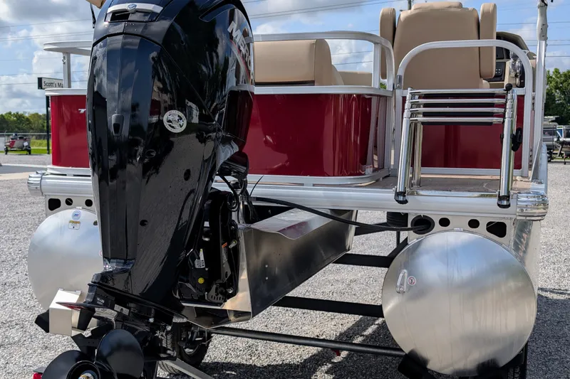 Slide: The Image of 2025 Sun Tracker Party Barge 18 DLX pontoon boat with powerful outboard motor. - 4