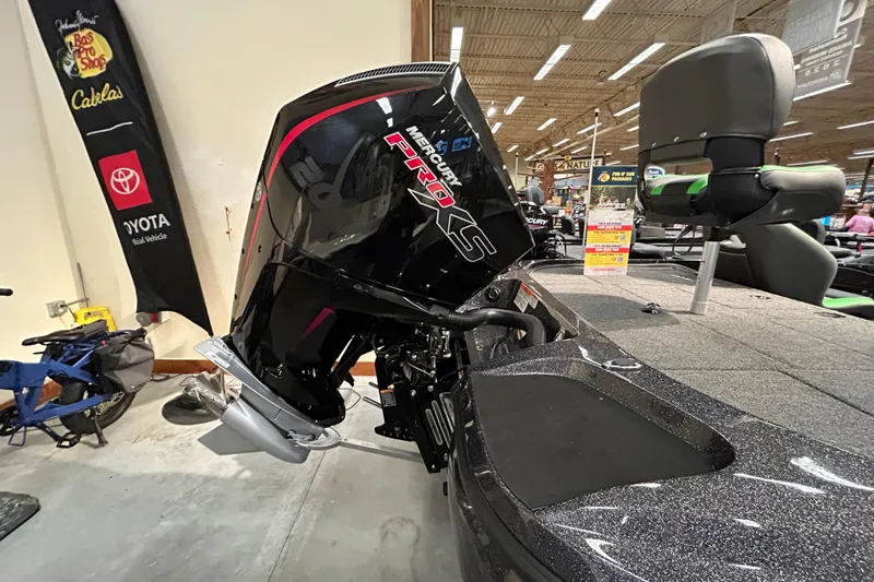 Slide: The Image of 2025 Nitro Z19 boat with Mercury Pro XS engine displayed indoors. - 6