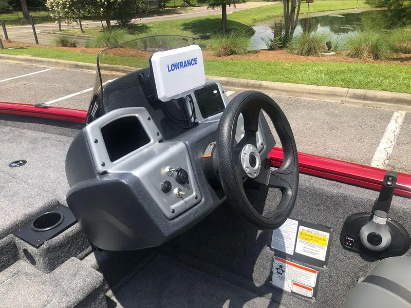 Slide: The Image of 2025 Tracker Pro Team 175 boat dashboard with Lowrance navigation system. - 10