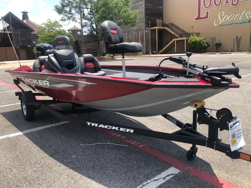 Slide: The Image of 2025 Tracker Pro Team 175 boat on trailer in parking lot. - 5
