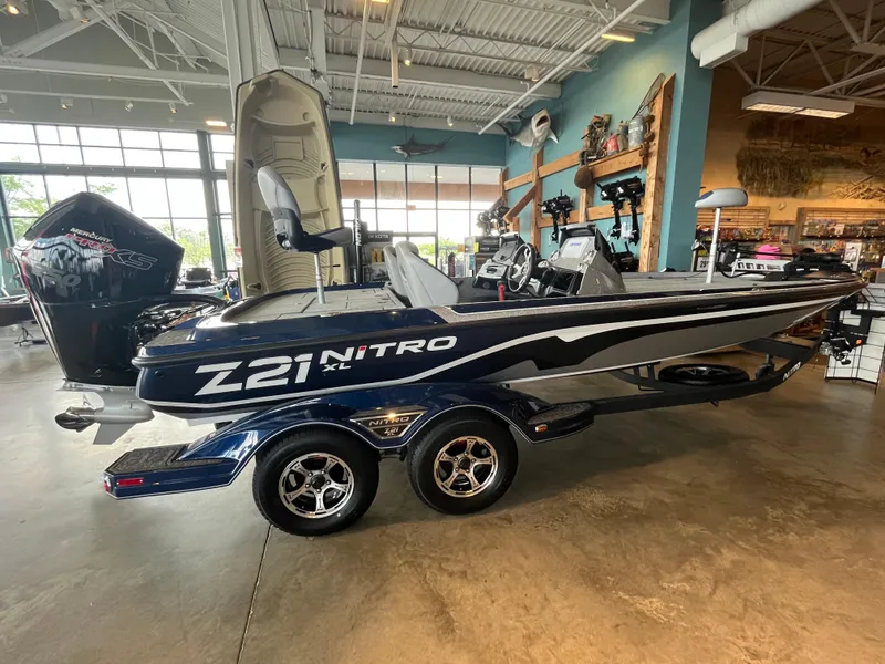 The Image of 2025 Nitro Z21 XL boat displayed indoors with sleek design and modern features. - 0