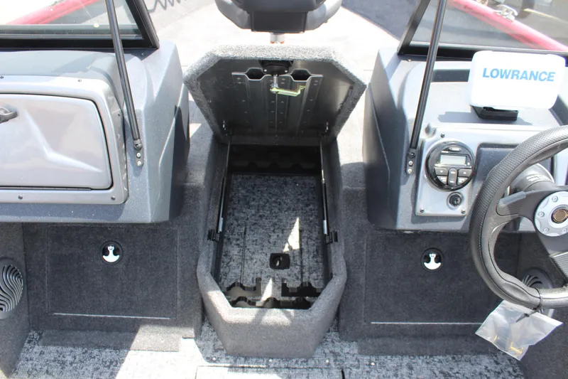 Slide: The Image of 2025 Tracker Pro Guide V-175 Combo boat interior with storage compartment and Lowrance electronics. - 21