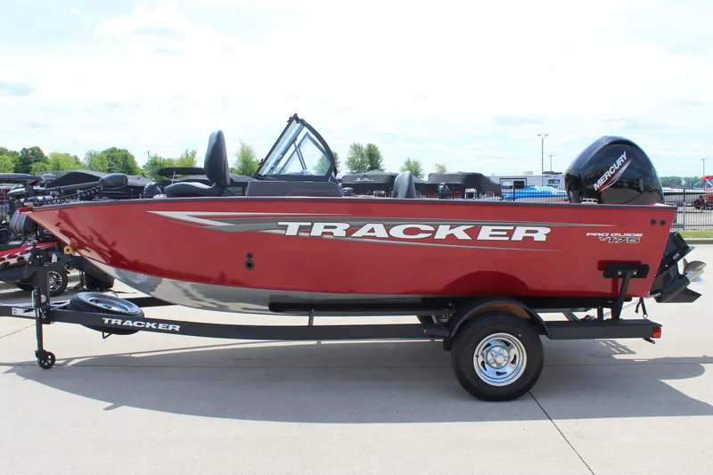 Slide: The Image of 2025 Tracker Pro Guide V-175 Combo boat in red on trailer. - 4
