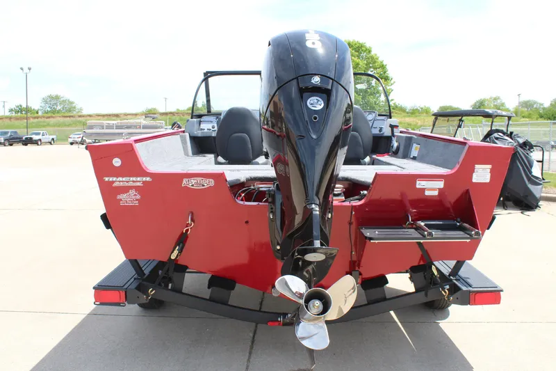 Slide: The Image of 2025 Tracker Pro Guide V-175 Combo boat, rear view with outboard motor. - 6