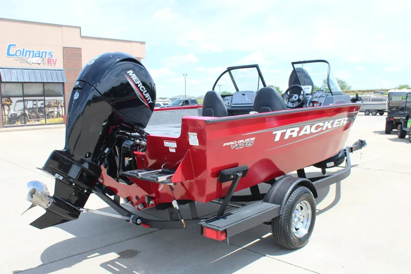 Slide: The Image of 2025 Tracker Pro Guide V-175 Combo boat with Mercury engine on trailer. - 7
