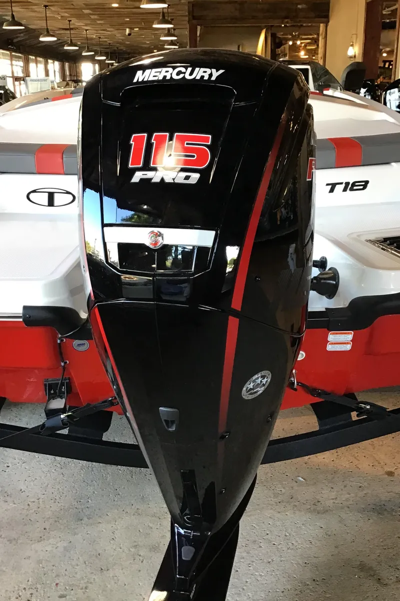 Slide: The Image of 2025 Tahoe T18 boat with Mercury 115 Pro outboard motor in showroom. - 3