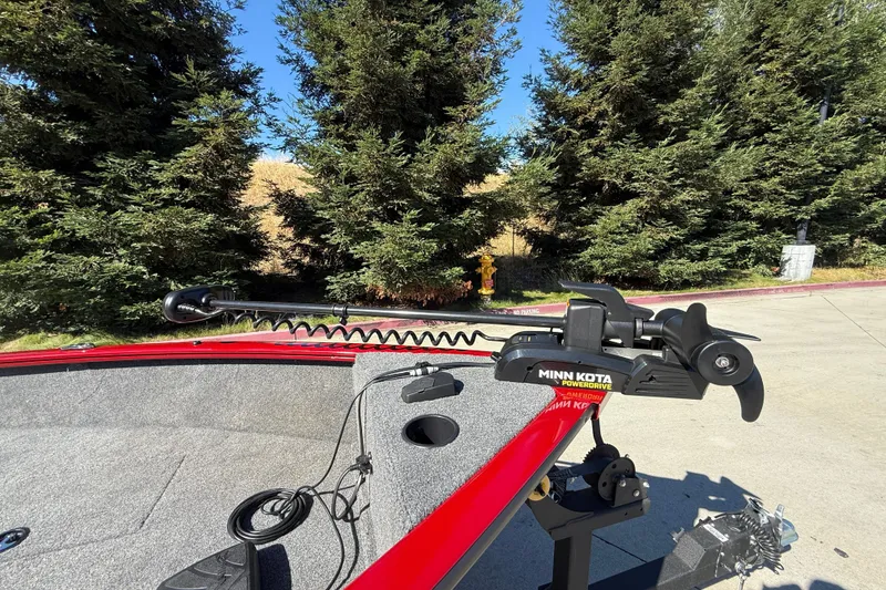 Slide: The Image of 2025 Tracker Super Guide V-16 T boat with Minn Kota PowerDrive trolling motor. - 11