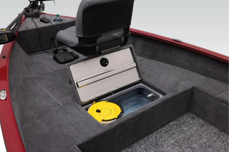 Slide: The Image of 2025 Tracker Super Guide V-16 T boat dashboard with controls and storage compartments. - 10