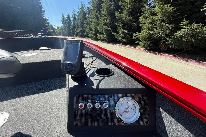 Slide: The Image of 2025 Tracker Super Guide V-16 T boat dashboard with GPS and RPM gauge. - 24