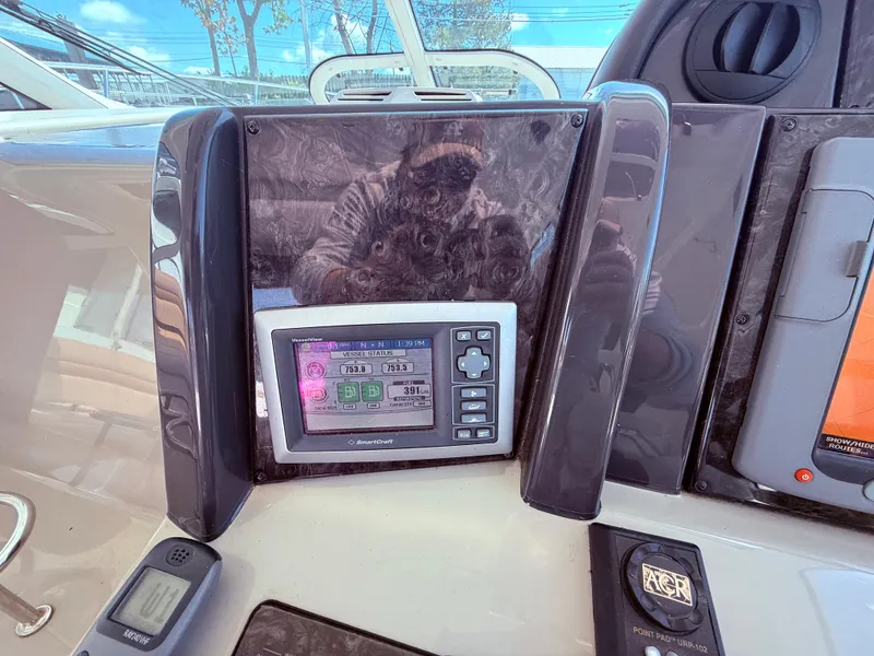 Slide: The Image of Control panel of 2009 Sea Ray 48 Sundancer yacht with navigation display. - 20