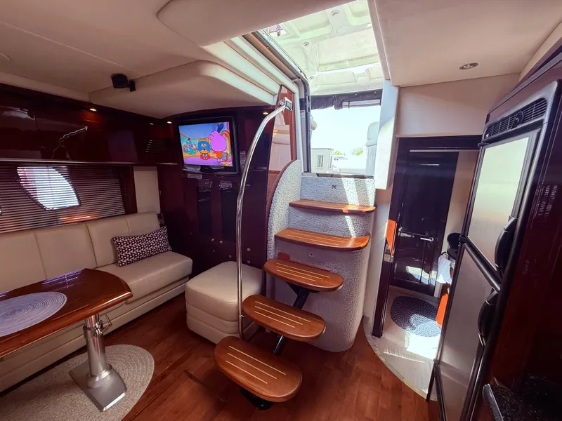 Slide: The Image of Luxurious interior of 2009 Sea Ray 48 Sundancer yacht with elegant wood finishes and modern amenities. - 31