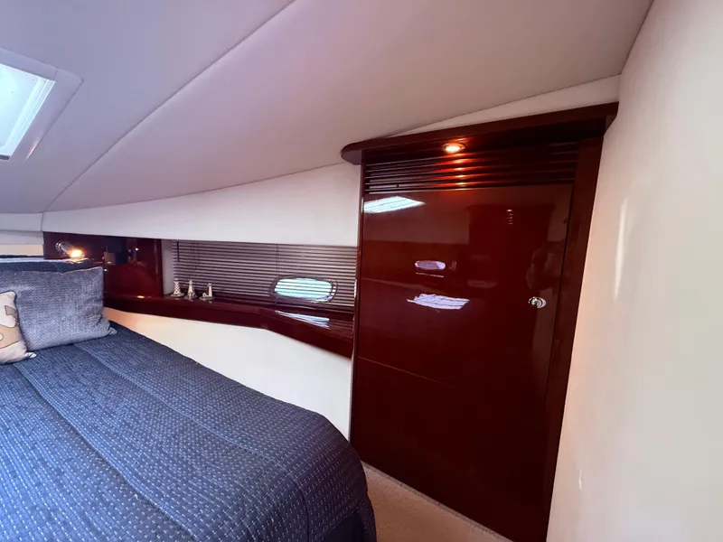 Slide: The Image of Luxurious cabin interior of 2009 Sea Ray 48 Sundancer yacht with elegant wood finish. - 35