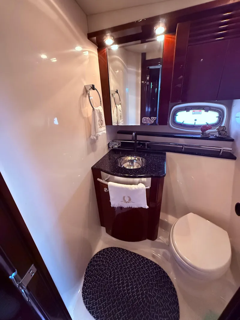 Slide: The Image of Luxurious bathroom in 2009 Sea Ray 48 Sundancer yacht with elegant fixtures and lighting. - 36