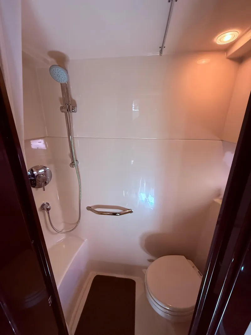 Slide: The Image of Bathroom interior of 2009 Sea Ray 48 Sundancer yacht with shower and toilet. - 43