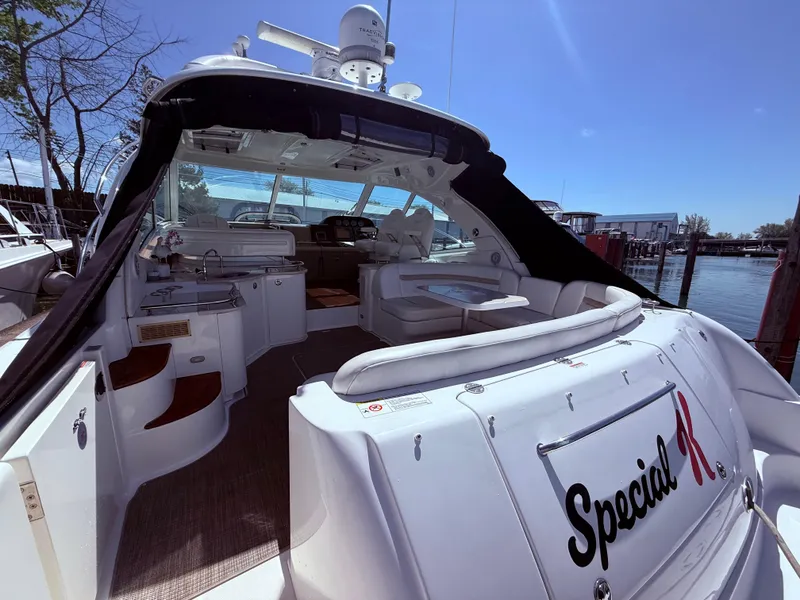 Slide: The Image of 2009 Sea Ray 48 Sundancer yacht with spacious deck and luxurious interior. - 5