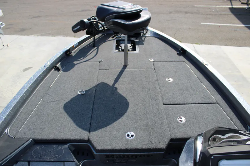 Slide: The Image of 2023 Ranger Z519 Ranger Cup Equipped boat deck with seating and storage compartments. - 5