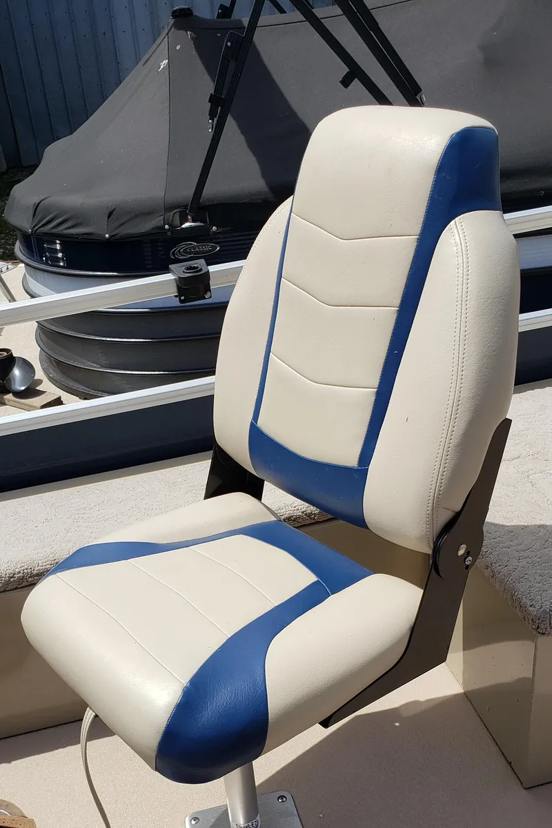 Slide: The Image of 2015 Lowe SF214 Sport Fish boat seat with blue and beige upholstery. - 5