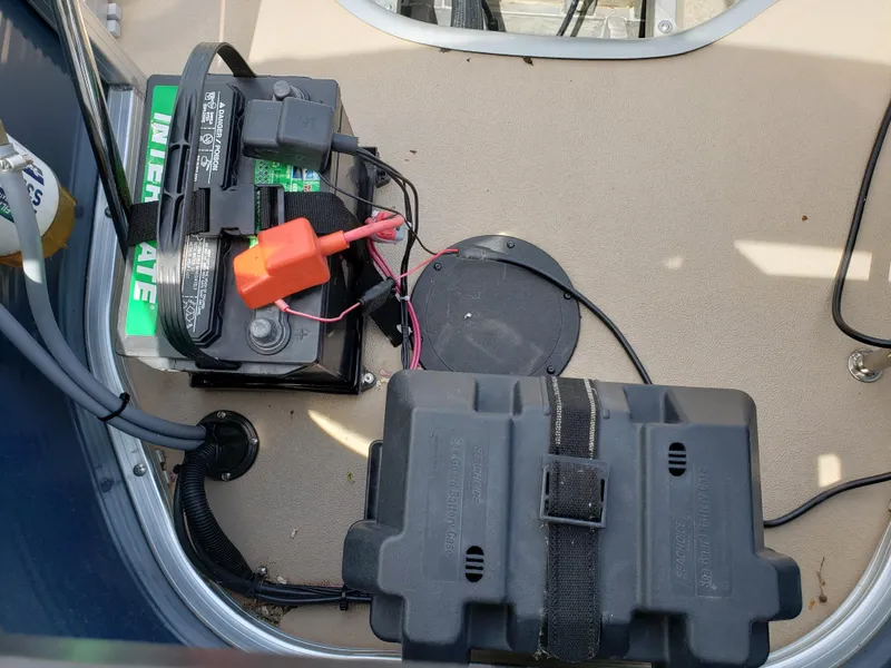 Slide: The Image of Battery setup on a 2015 Lowe SF214 Sport Fish boat deck. - 9
