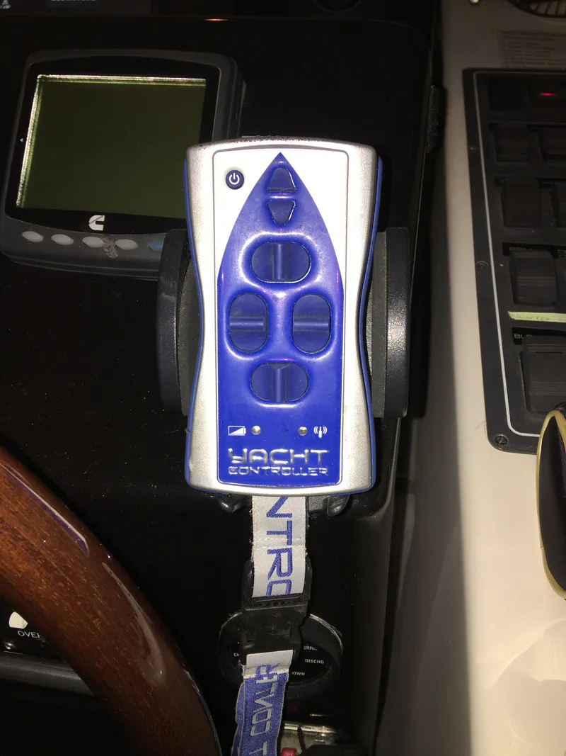 Slide: The Image of Remote control for 2005 Tiara Yachts 4400 Sovran, featuring blue and silver design. - 13