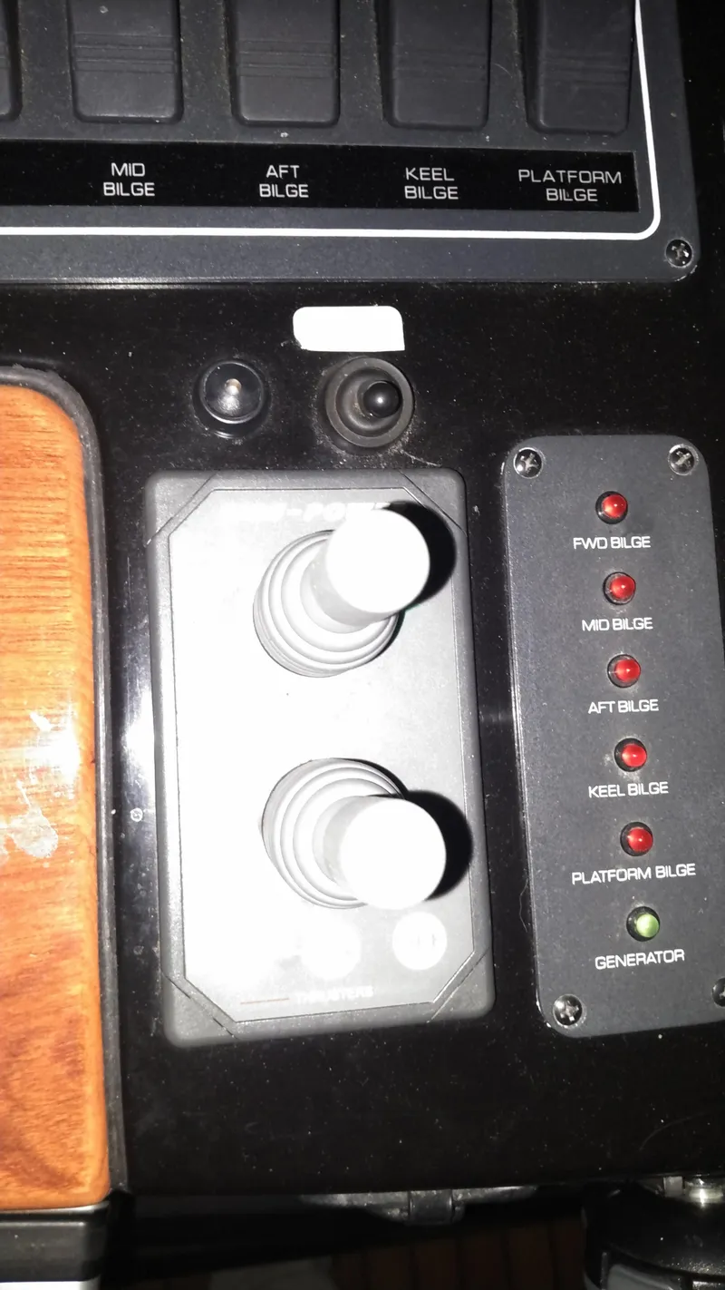 Slide: The Image of Control panel of a 2005 Tiara Yachts 4400 Sovran with bilge switches and indicators. - 18