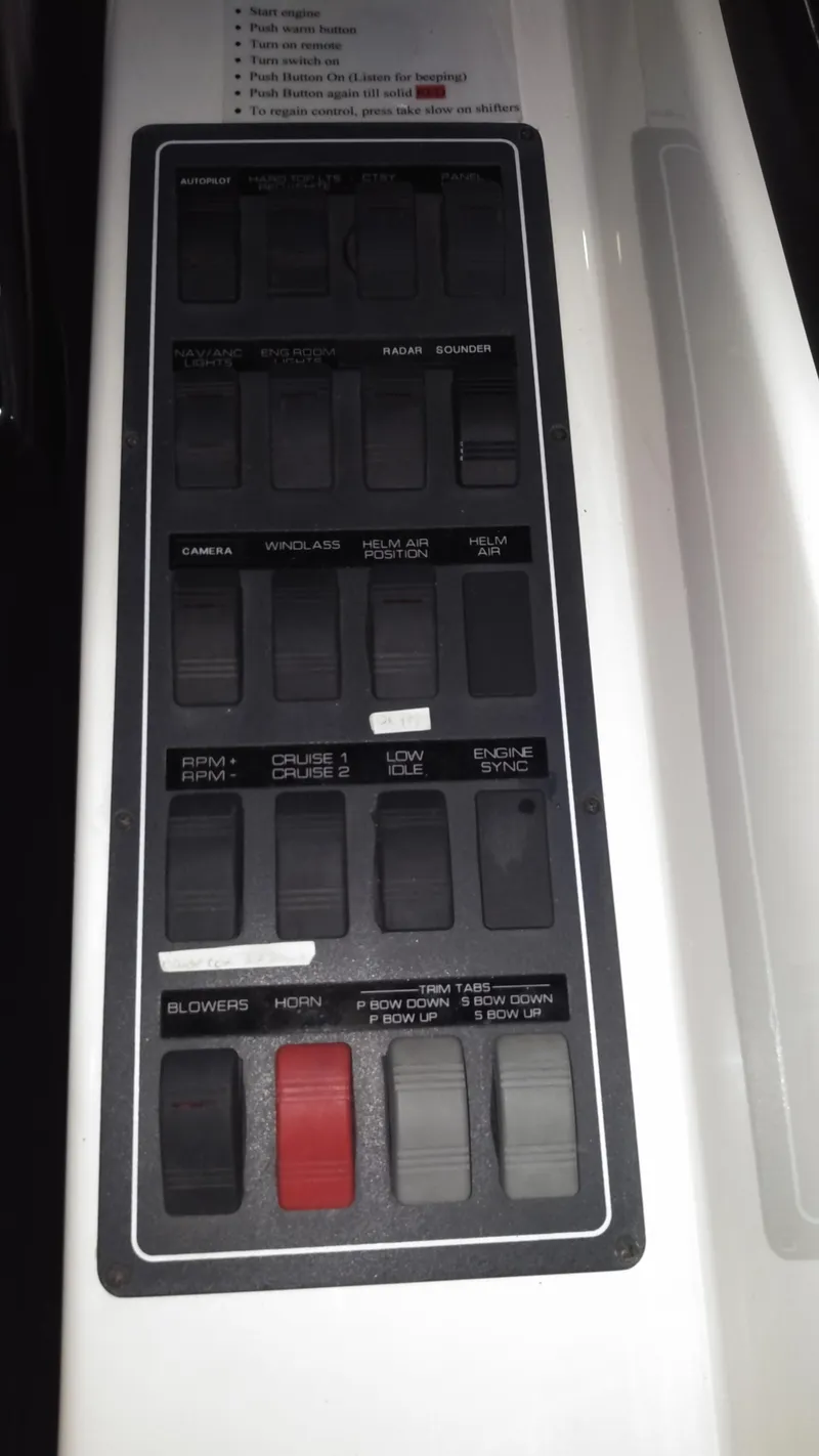 Slide: The Image of Control panel of a 2005 Tiara Yachts 4400 Sovran with labeled switches. - 19